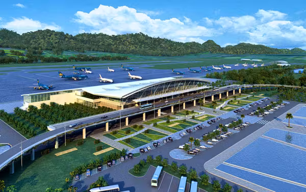 Phu Quoc International Airport with its modern terminal set against the backdrop of a tropical island.